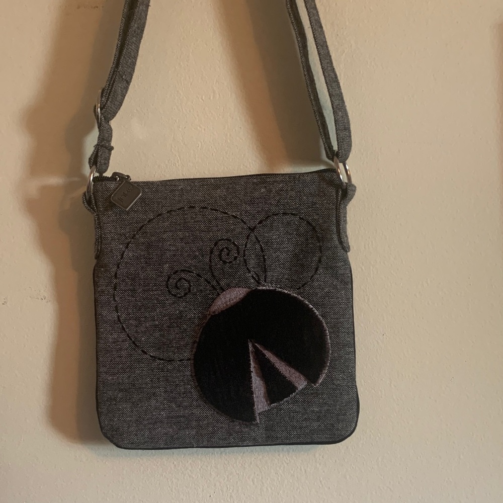 Elegant Gray Crossbody Bag with Artistic Design